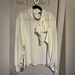 Lovely dressy blouse from White House Black Market.   Size L